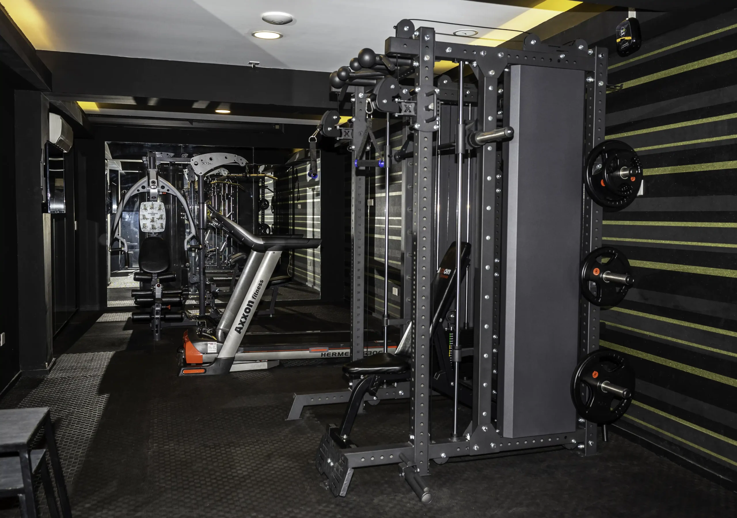 Gym equipment in a modern, well-lit fitness center