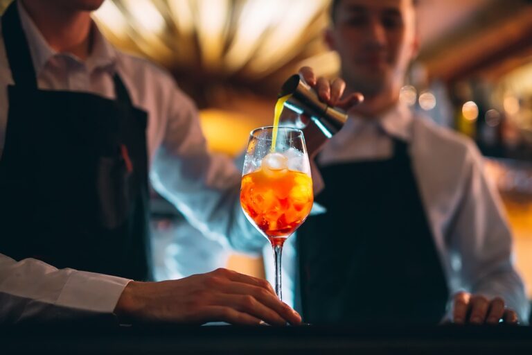 Two Barmen crafting a cocktail drink on rooftop bars in Larnaca.