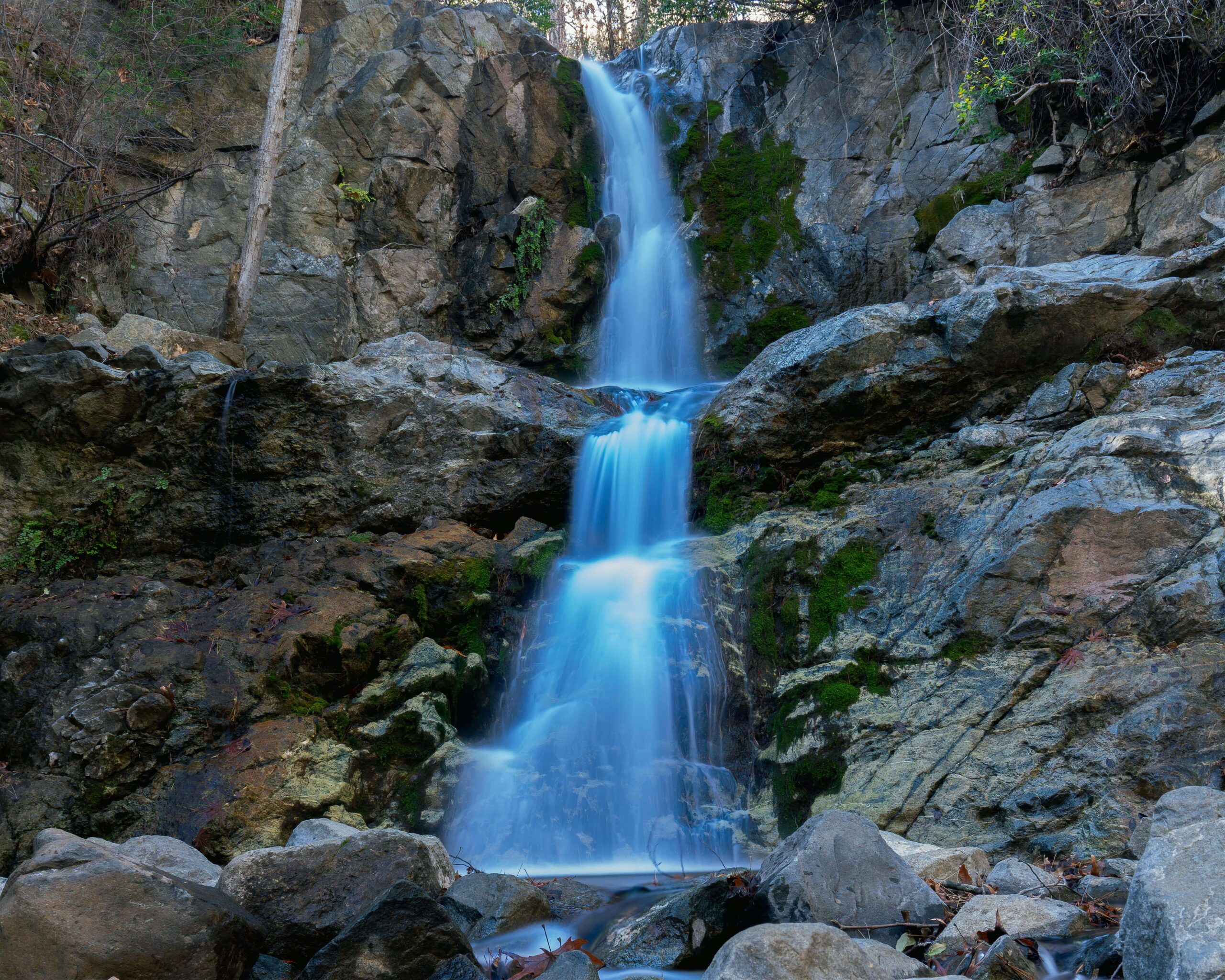 Caledonia Waterfall surrounded by rocky terrain and greenery in Cyprus