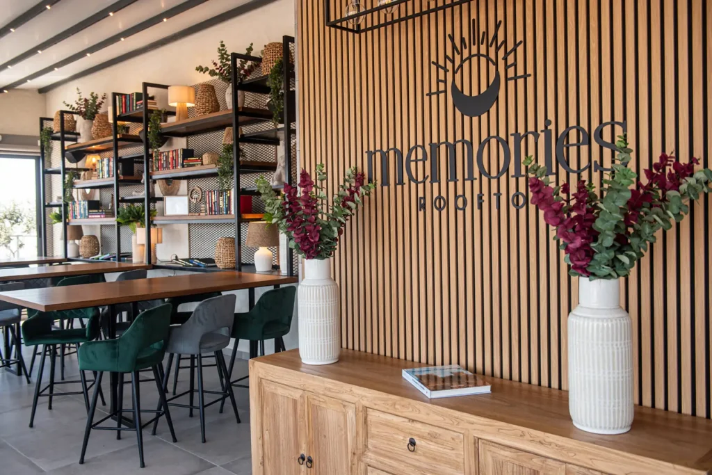 Memories Rooftop logo, wooden design and flower vases